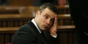 Oscar Pistorius, gestures, at the end of the fourth day of sentencing proceedings in the high court in Pretoria, South Africa. Picture from associated press, Huffington Post.